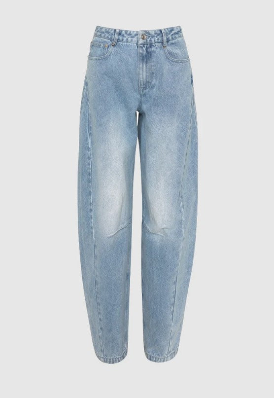 wide leg barrel leg jeans on a white background