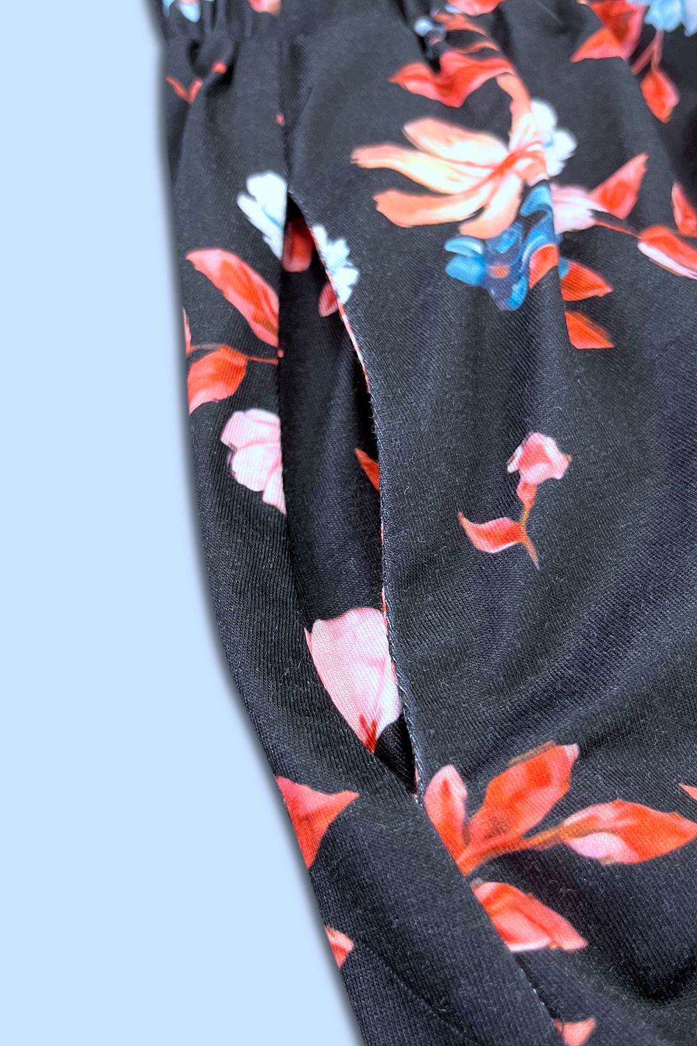 Floral-patterned fabric on a black background