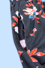 Floral-patterned fabric on a black background