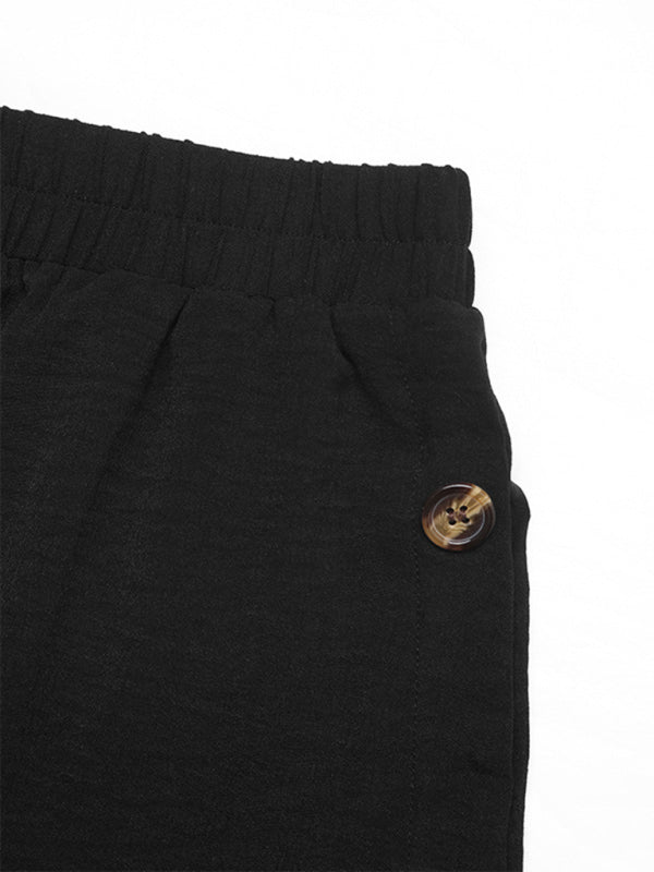 Close-up of high waist and fabric texture on black skirt