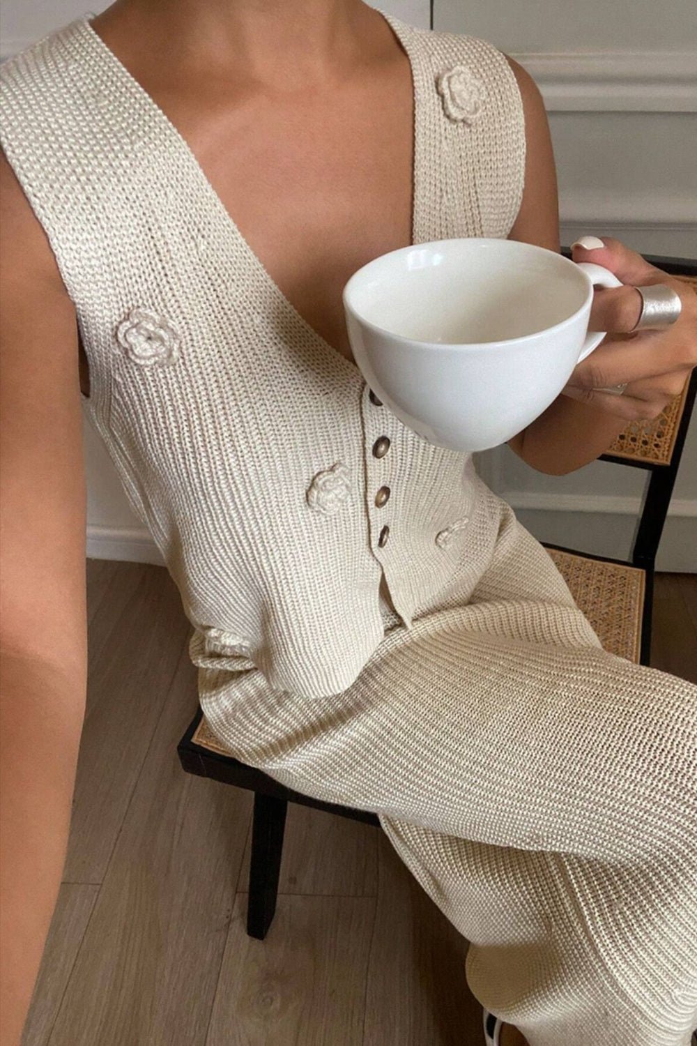 Close-up of the Arlo Skirt and Top Two Piece Set in cream highlighting the floral embellishments.