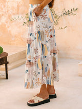 Side view of the Asha Maxi Skirt showing its tiered flowing design and lightweight fabric.