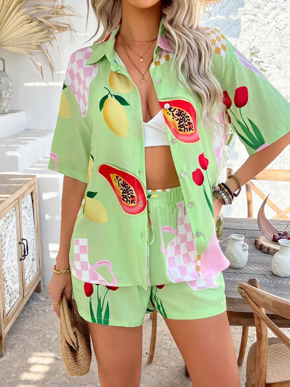 Woman modeling Back to You Two Piece Set in green print with shirt and shorts.