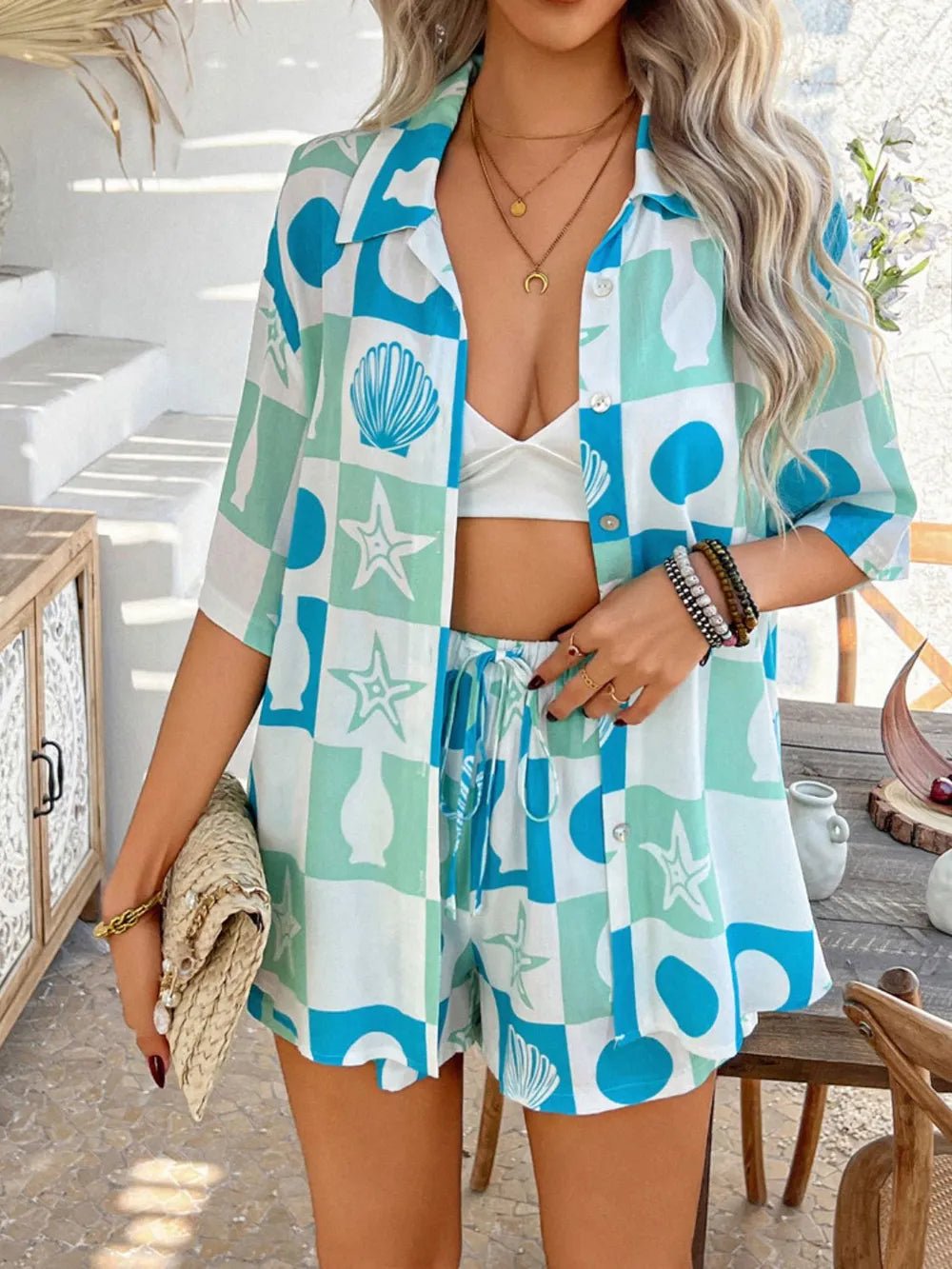 Woman wearing Back to You Two Piece Set in blue with collared shirt and shorts.