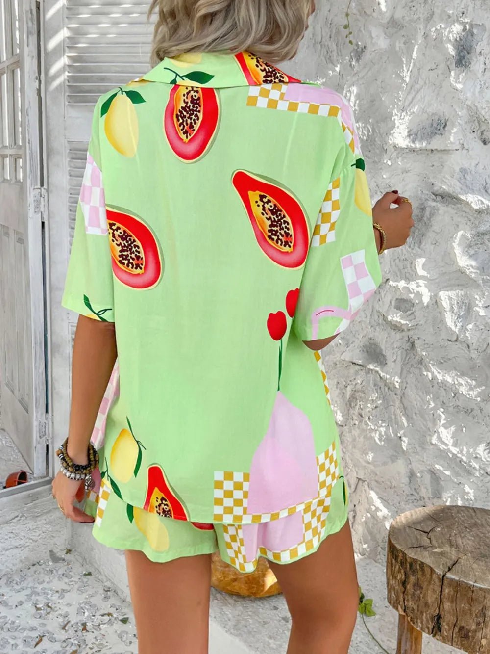 Back angle of Back to You Green Two Piece Set showing relaxed shirt and drawstring shorts.