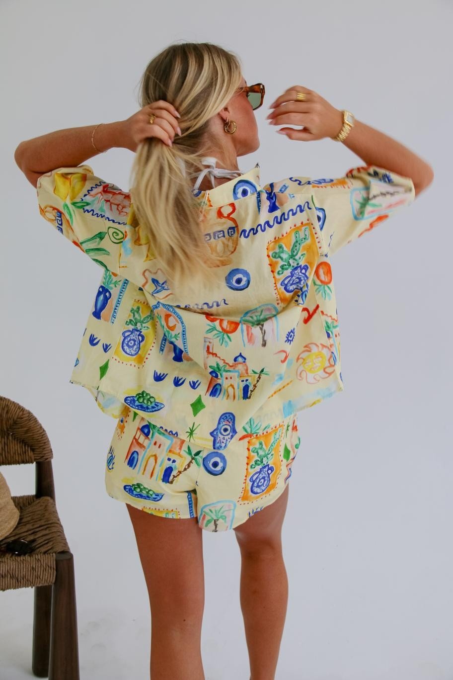 Back view of Cairo Shirt & Shorts Set highlighting relaxed fit shirt and vibrant conversational print.
