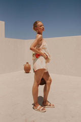 Full-body image of the Cali Shorts and Top Two Piece Set styled for a sunny outdoor look.