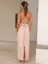 Back view of the Calista Skirt and Top Two Piece Set in blush styled for a formal occasion.