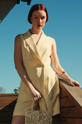 Side view of the Clara Vest and Shorts Two Piece Set showing the sleek structured fit.