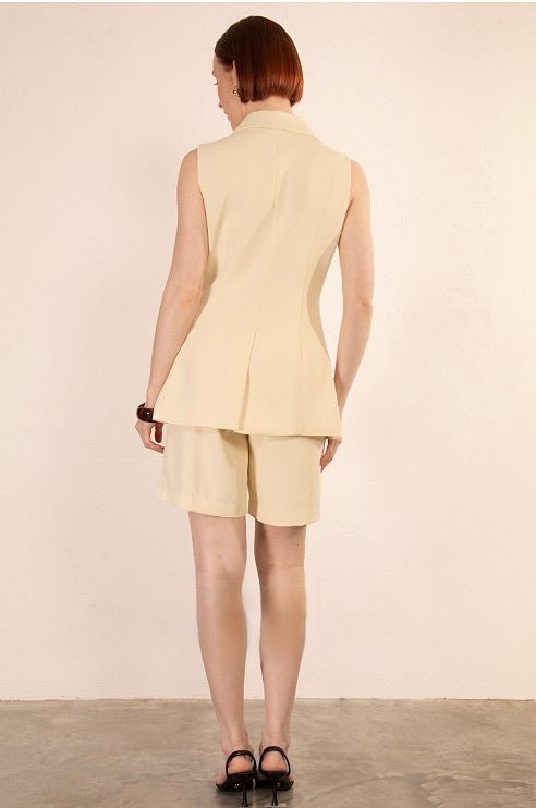 Back view of the Clara Vest and Shorts Two Piece Set highlighting the vest's clean tailoring and short hemline.