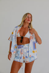 Front view of Borleigh Skirt and Top Set with long-sleeve V-neck button-up top.