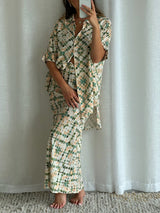 Close-up view of the Echo Slip Skirt's drawstring waistband, focusing on the tie detail and fabric texture.