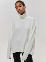 Woman posing in the White Falling For You Sweater showing full outfit styling.