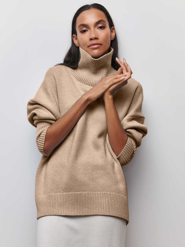 Front-facing view of the Khaki Falling For You Sweater styled with white skirt