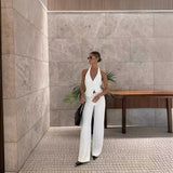 Side view of white halter top and wide-leg pants from the Flair Set