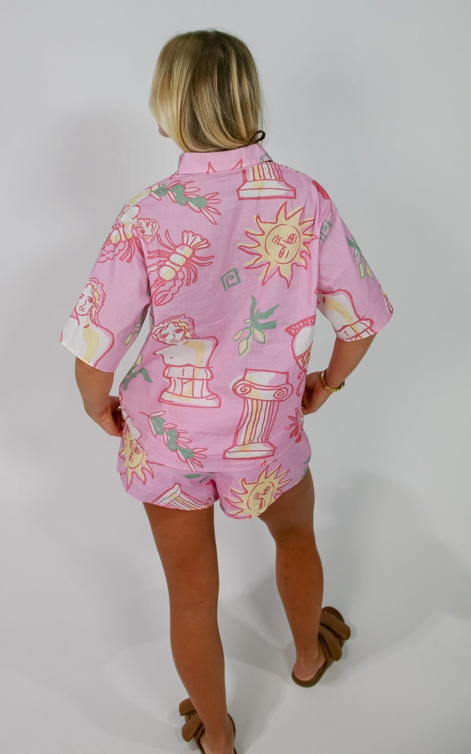 Back view of the Girls Weekend Set, highlighting the oversized fit of the shirt and high-waisted shorts with a tie detail.