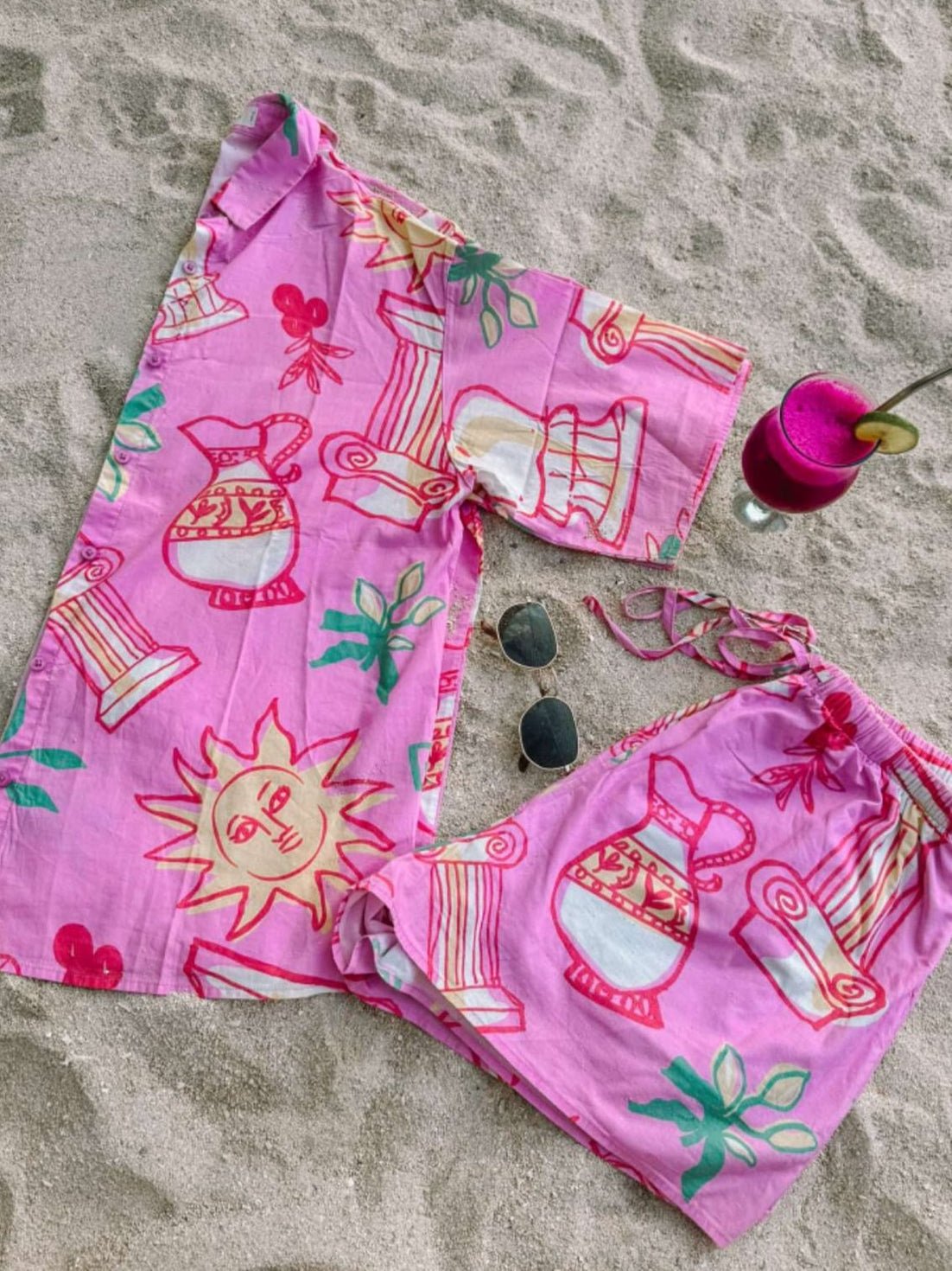 Flat lay of the Girls Weekend Set in pink, showing the breathable cotton fabric and coordinated print design.
