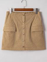 Front view of tan corduroy mini skirt on hanger