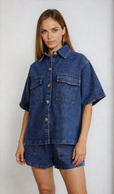 Front view of the Indigo Denim Two Piece Set buttoned up, highlighting the oversized shirt and mid-thigh shorts.