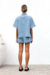 Full back view of the denim-look set, showing relaxed fit.