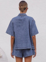 Back view of shirt showing relaxed shoulders and boxy shape.