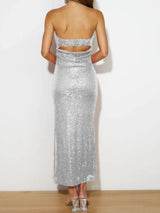Silver sequin strapless gown on a plain white background