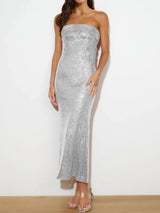 Silver strapless sequin dress on a plain background