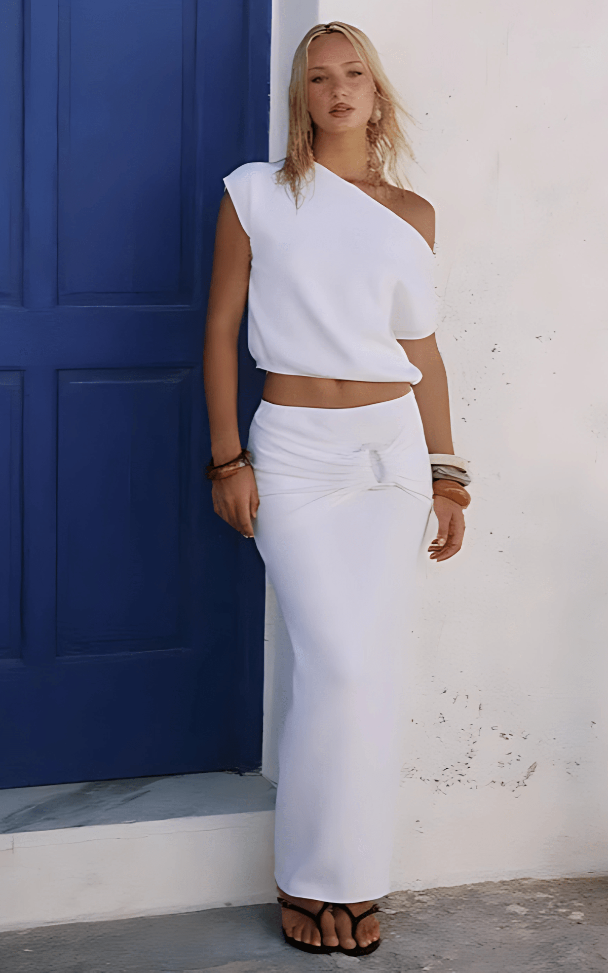 Side view of the Kamryn Two Piece Set showing the asymmetrical neckline and flattering fit.