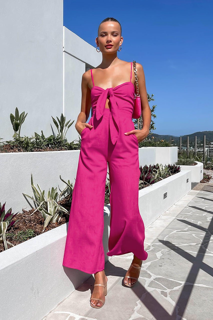 Leela Wide Leg Jumpsuit in Hot Pink, outdoor shot with vibrant colour and flattering fit