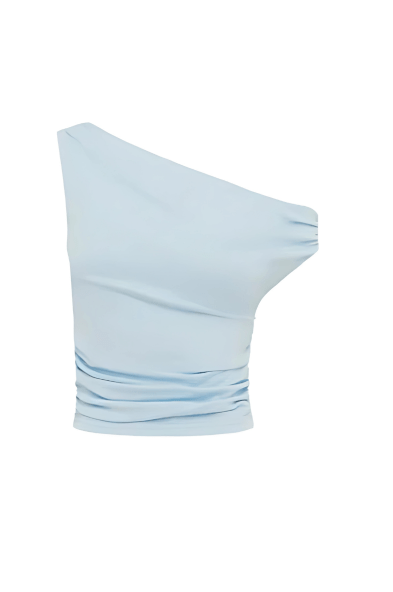 Flat-lay of the Malani Top in light blue, showcasing construction and shape.