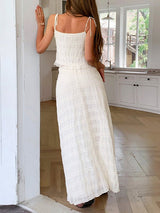 Back view of the Marbella Skirt and Top Two Piece Set in white highlighting its airy fabric.