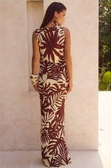 Side profile of model showcasing the full maxi skirt length.