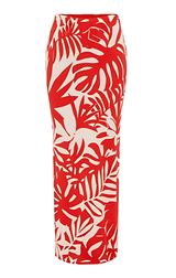 Product-only image of red maxi skirt with white abstract leaf print.