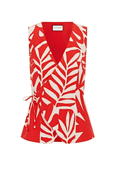 Flat lay of the Matelo Vest showing the red and white print and tie-up wrap style.