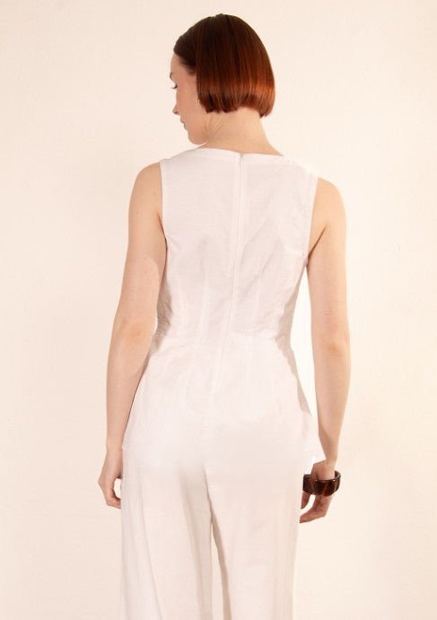 Studio back view showing the zip closure of the Mercer Sleeveless Top.
