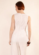 Studio back view showing the zip closure of the Mercer Sleeveless Top.