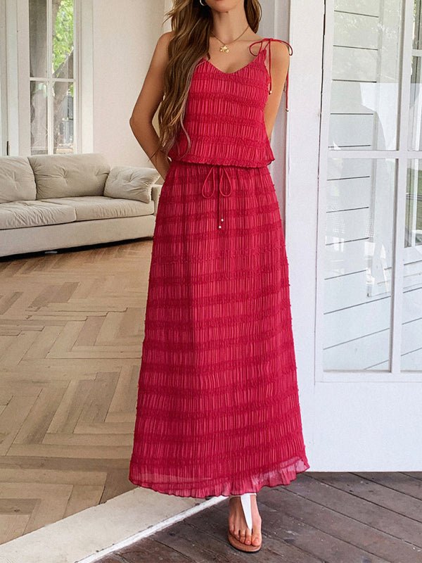 Model wearing the Nara Skirt and Top Set in red – tie-strap cami and high-waisted maxi skirt