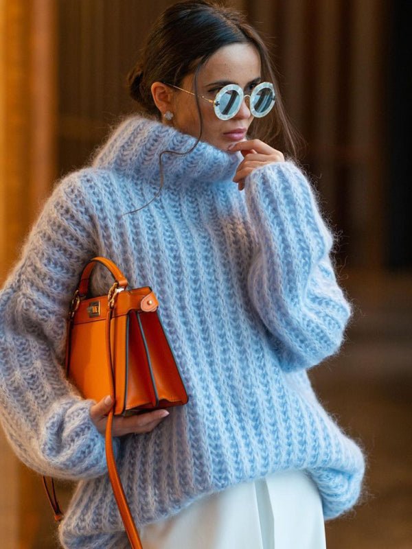 Close-up of the Rainy Dayz Sweater in blue showing the thick knit texture and turtleneck.
