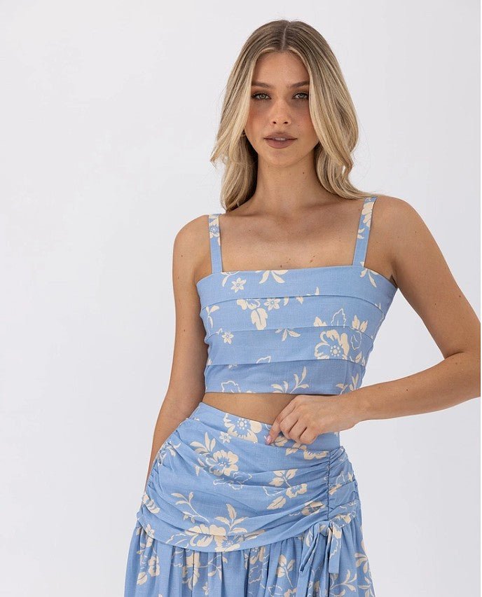 Close-up of crop top and waistband details in the blue Ralene Set.