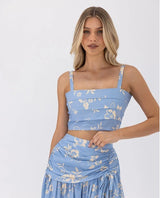 Close-up of crop top and waistband details in the blue Ralene Set.