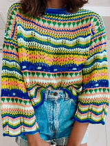 Woman wearing Blue Indigo Print with sleeves down and tucked into denim shorts.