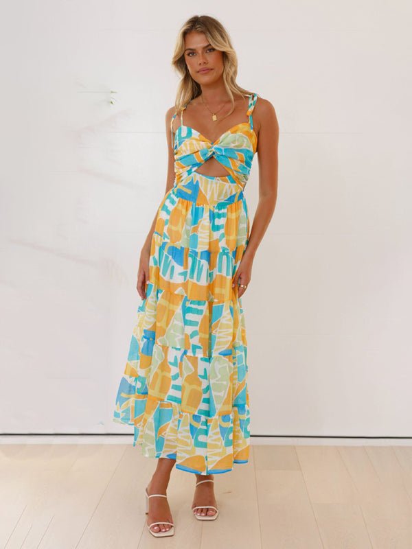 Woman wearing a colorful patterned dress against a white background
