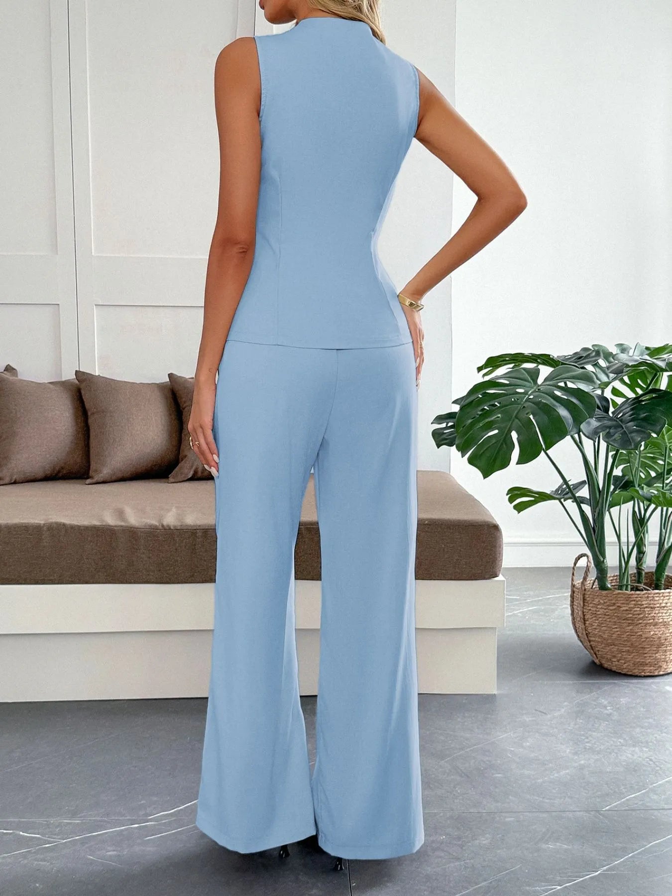 Back view of Shameela set showing tailored fit and length of vest and trousers