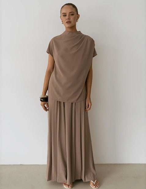 Model wears full Sharee set with top and pants, styled for a clean two-piece look.