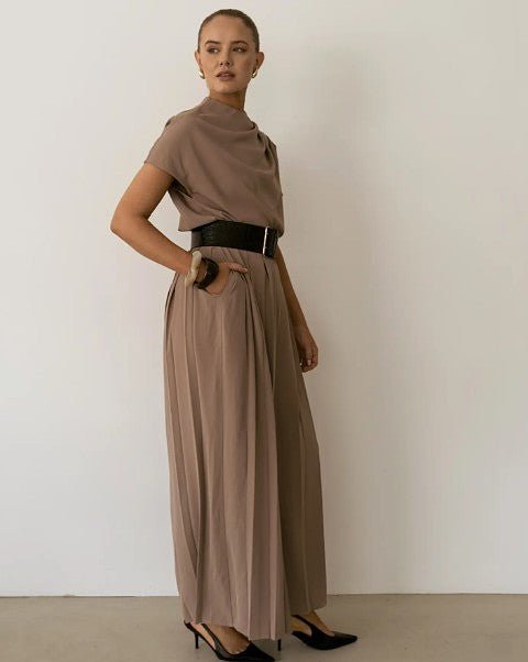 Sharee Pants shown in motion, highlighting flowy fabric and elegant movement.