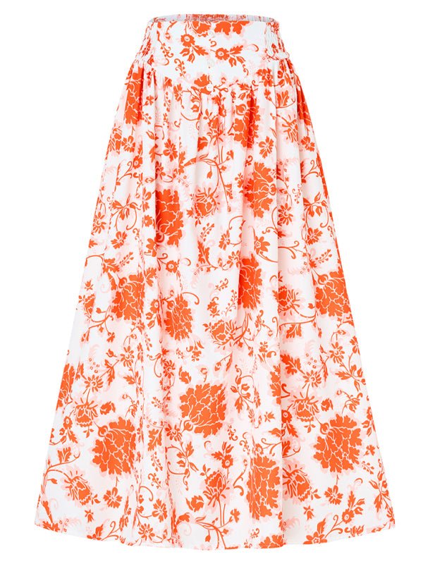 Flat-lay image of orange floral Summer Love Skirt highlighting its maxi length and bold print.