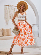 Summer Love Skirt in orange floral print styled with a lace crop top and straw hat.