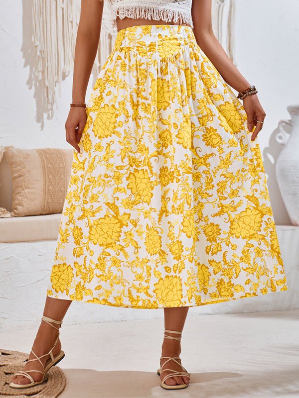 Close up view of yellow Summer Love Skirt showing flowy fabric and relaxed fit. 