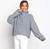 Smiling model in the Chocolate Brown jumper showing relaxed sleeves and high neckline.