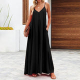 Full-length view of The Harlot Jumpsuit in black, styled for casual summer wear.